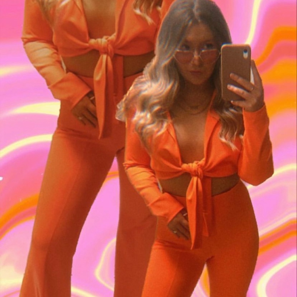 ASOS two-piece matching tie-front & bell bottom pant set.